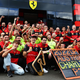 A photo of the Ferrari F1 team celebrating a win.